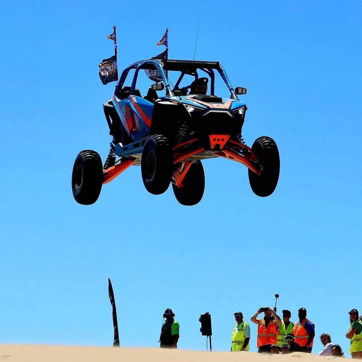 Polaris Pro R LT80" Front Baja Kit - AVID Racing jumping in the sand dunes at Huckfest UTV takeover