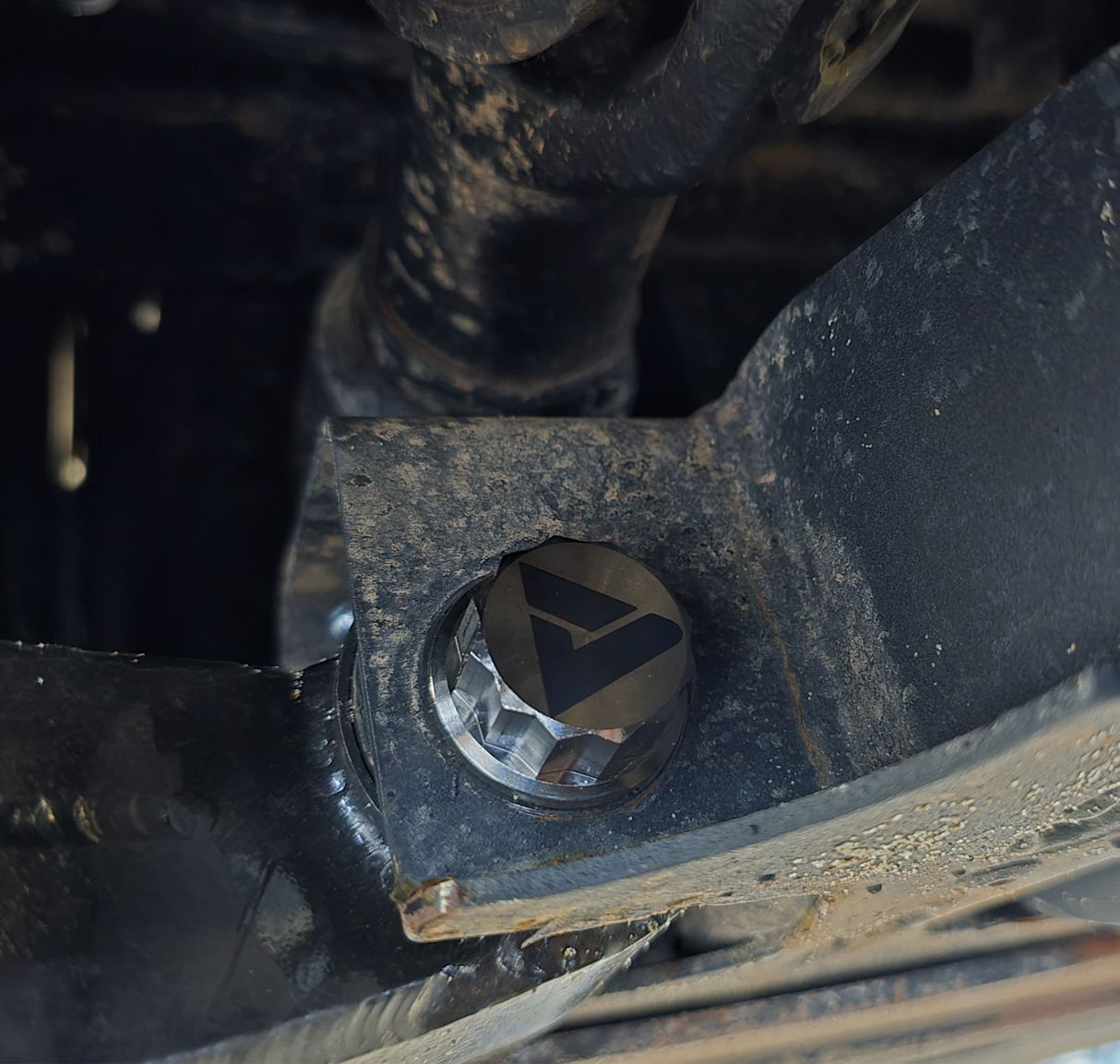 AVID Racing Can-Am Maverick R Stock Front Control Arm Titanium Bolt Hardware Kit bottom view mounted on vehicle