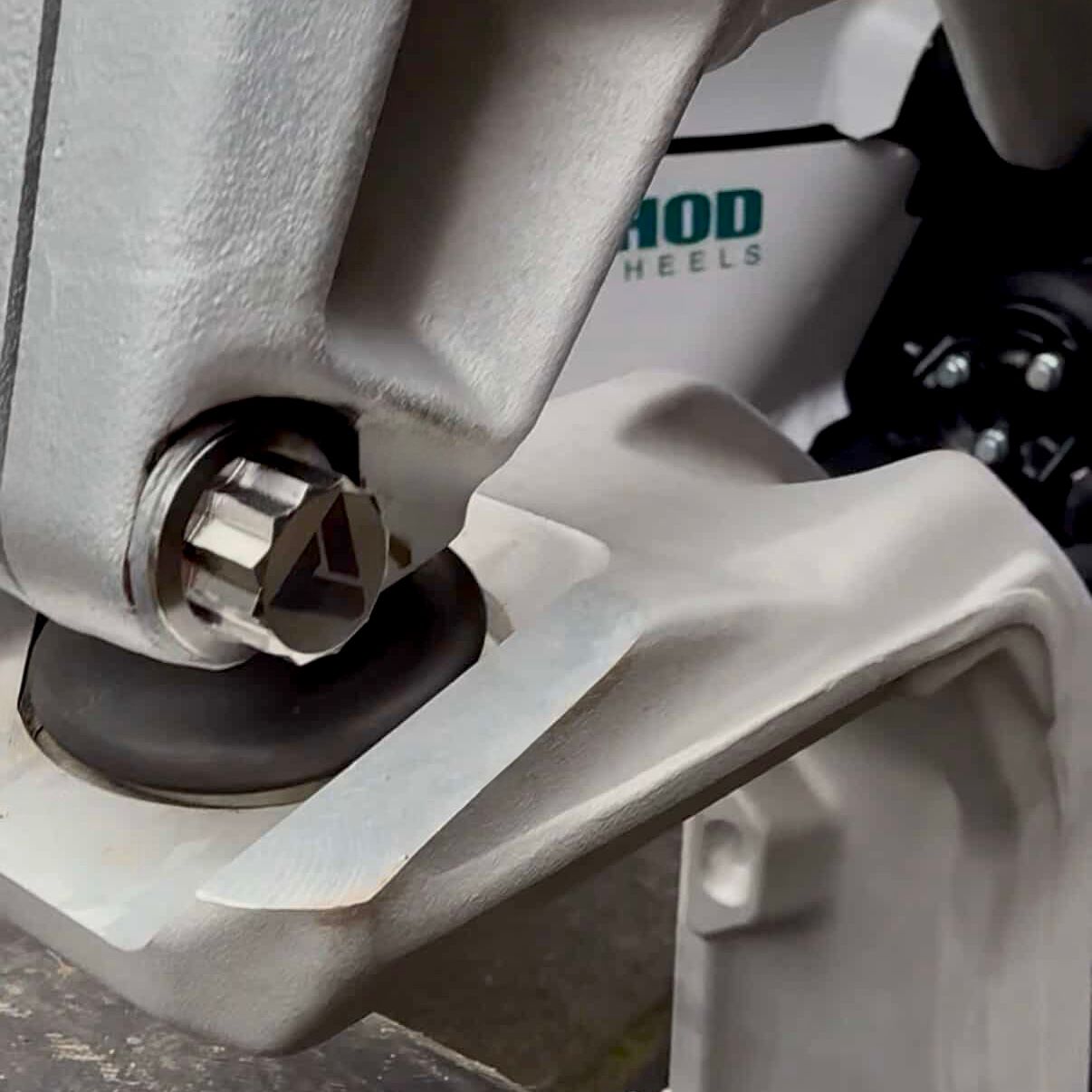 AVID Racing Upper Control Arm Titanium Hardware Dress-Up Kit side view of hardware mounted on vehicle