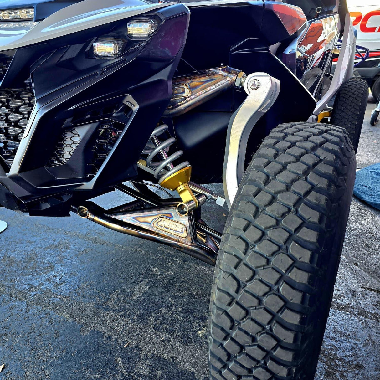 AVID Racing Can-Am Maverick R Baja Race Front Control Arm Kit left view mounted on vehicle