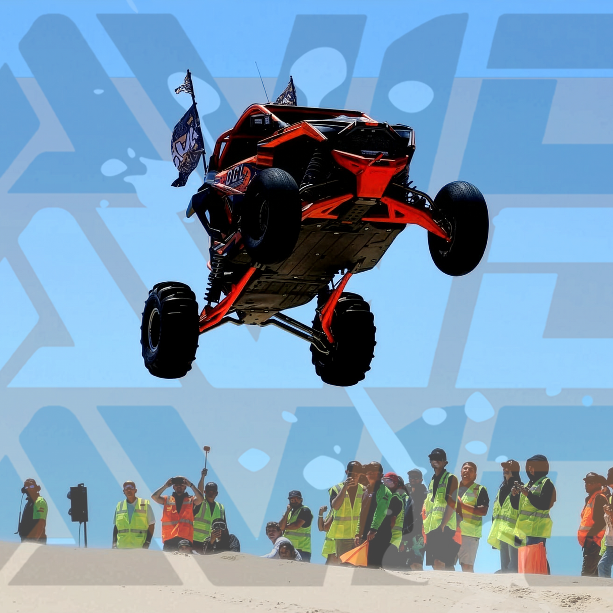AVID Racing Polaris Pro R XC High Clearance Radius Rod Kit jumping a sand dune with spectators in background