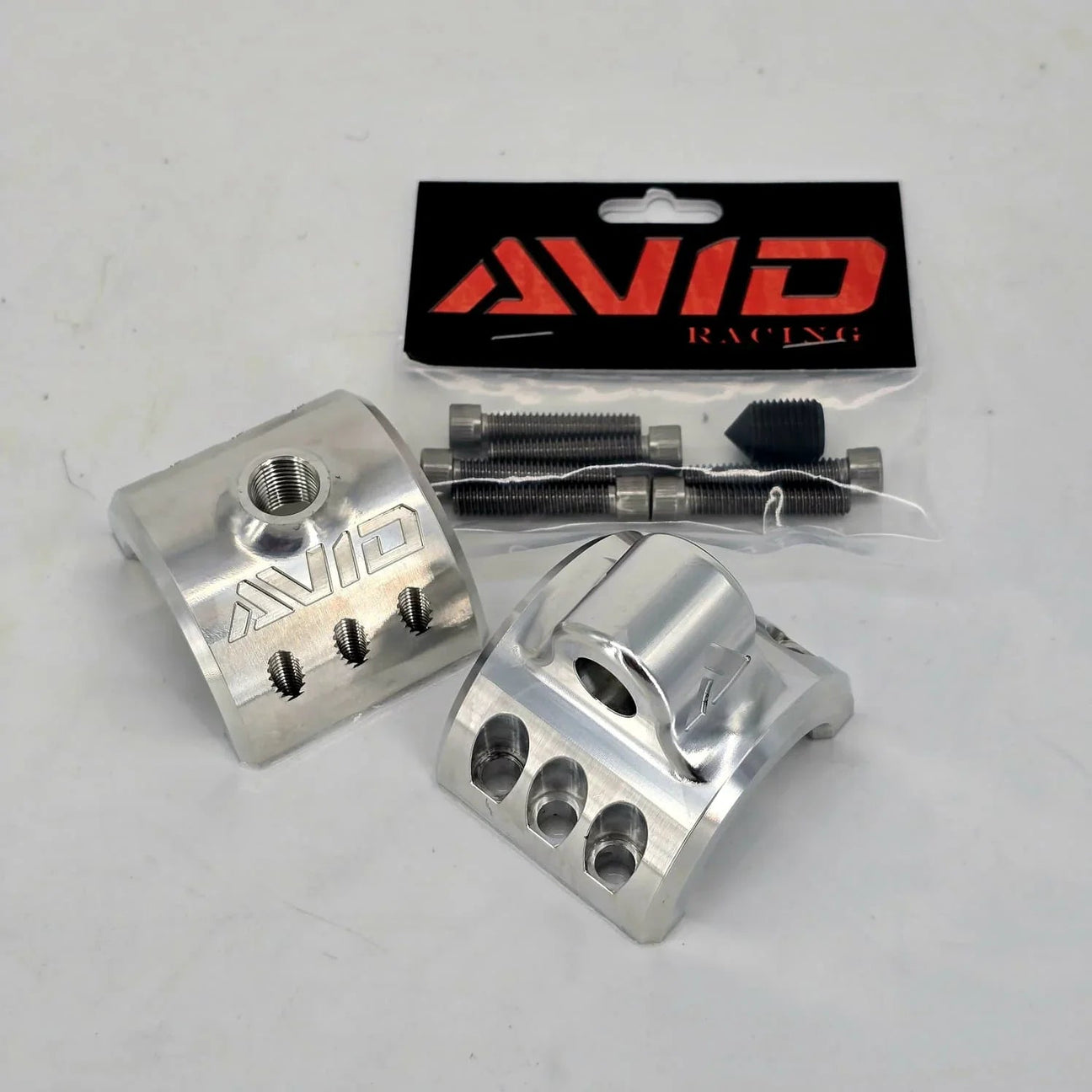 Universal Billet Limit Strap Tube Clamps | AVID Racing in branded packaging