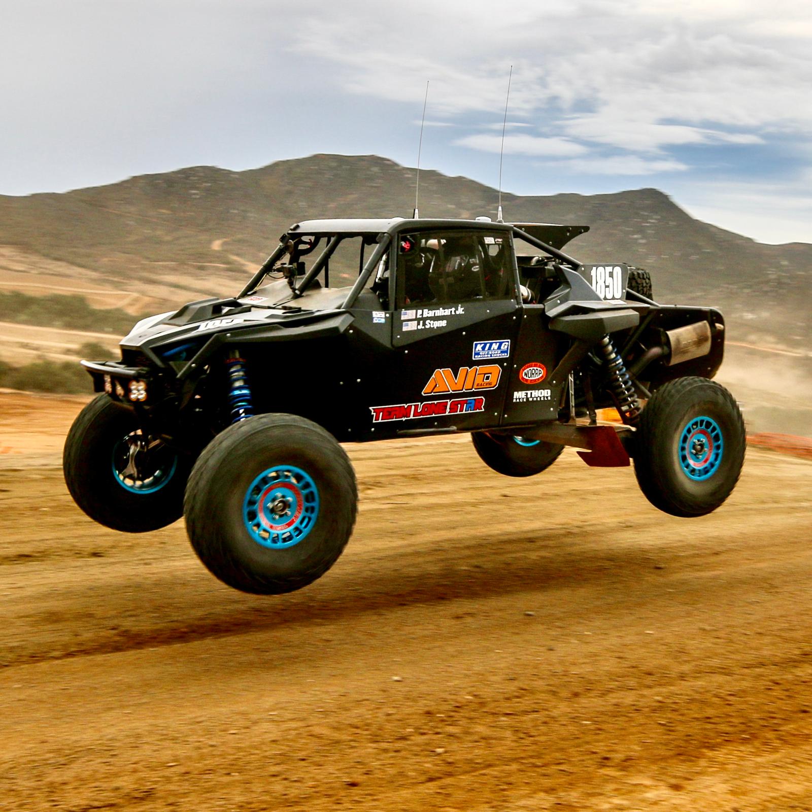 Polaris RZR Pro R desert race car with AVID Racing long travel suspension kit