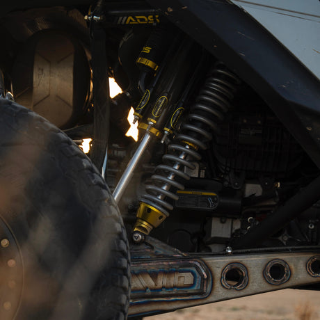 AVID Racing Can-Am Maverick R Rear Race Trailing Arm and Dual Shock Conversion Kit detail of dual shocks mounted on vehicle