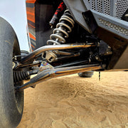 Polaris Pro R LT80" Front Baja Kit - AVID Racing showing TIG welded chromoly and billet tie rods mounted on vehicle close up