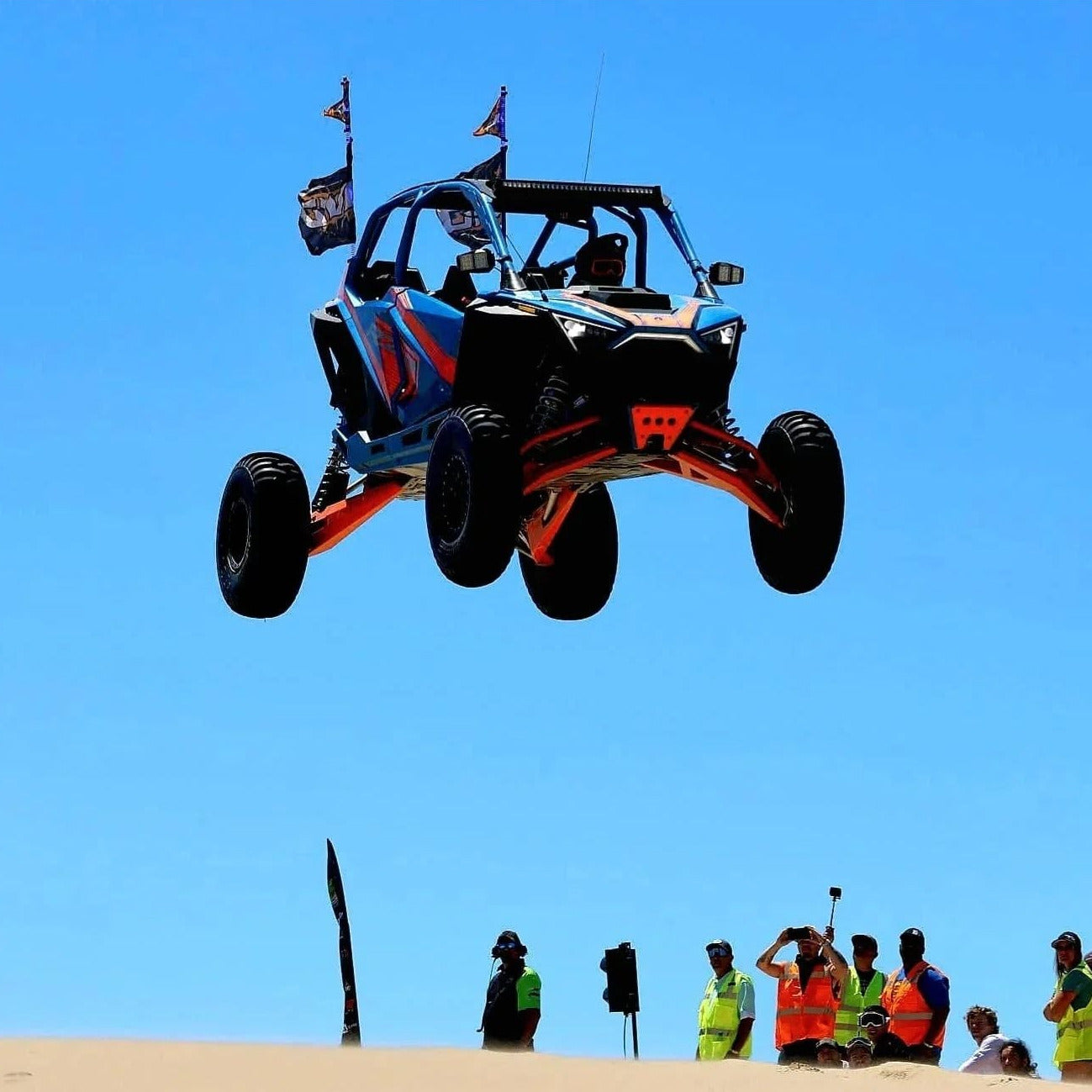 Polaris Pro R LT80" Front Baja Kit - AVID Racing jumping in the sand dunes at Huckfest UTV takeover