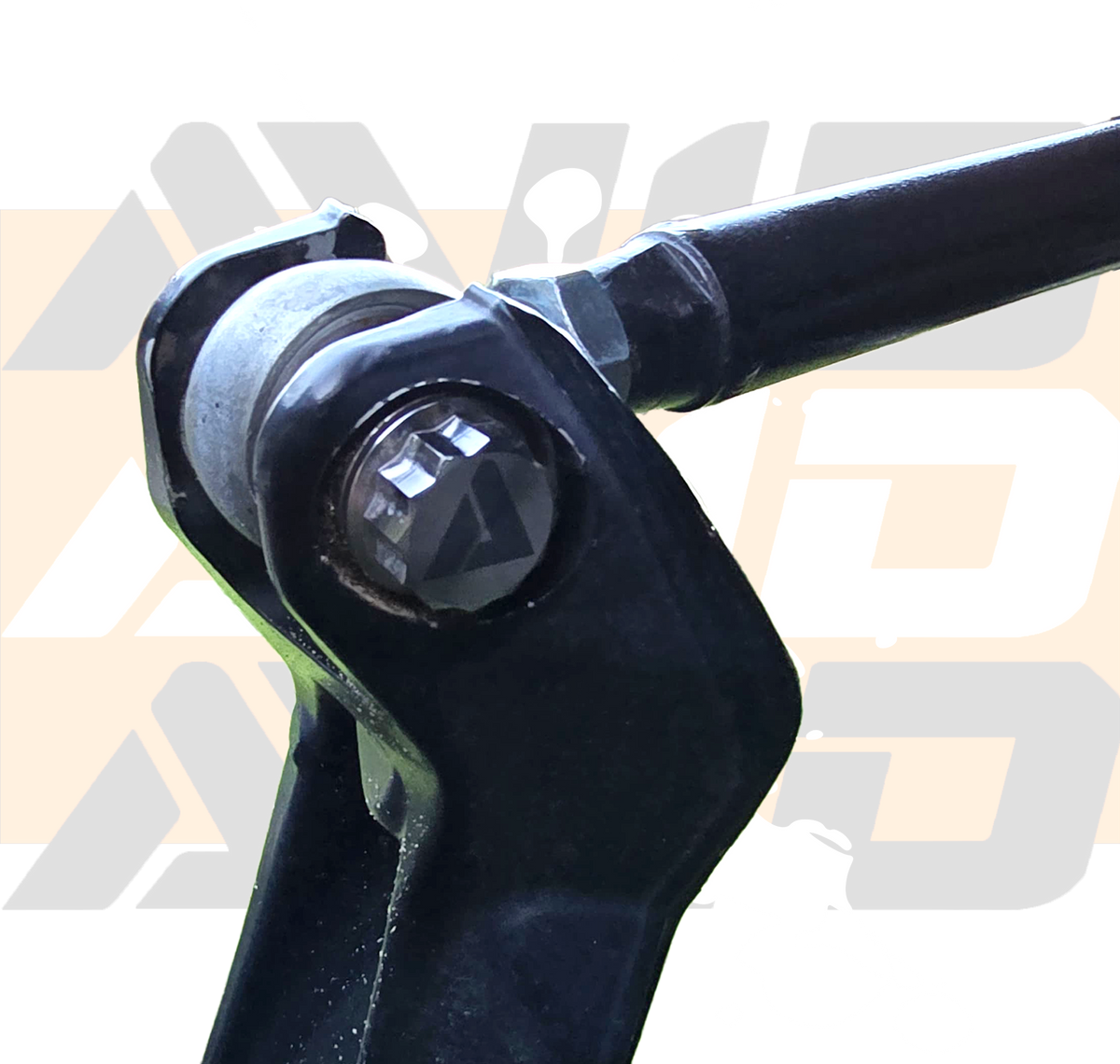 AVID Racing Upper Control Arm Titanium Hardware Dress-Up Kit close up of bolt mounted on vehicle