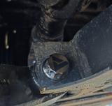 AVID Racing Can-Am Maverick R Stock Front Control Arm Titanium Bolt Hardware Kit bottom view mounted on vehicle
