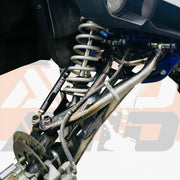 AVID Racing XC 64" stock width suspension kit mounted on vehicle with AVID's billet brake line clamp