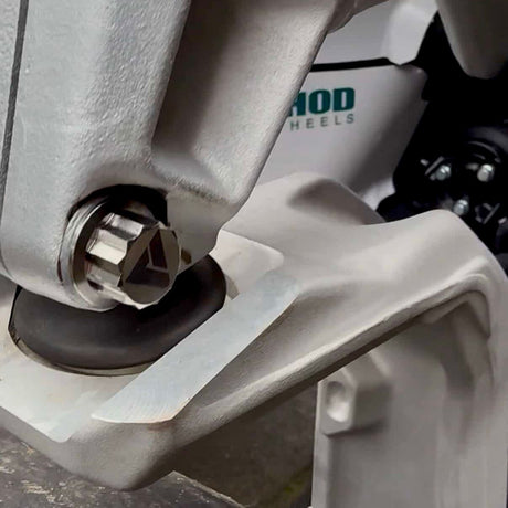 AVID Racing Upper Control Arm Titanium Hardware Dress-Up Kit side view of hardware mounted on vehicle