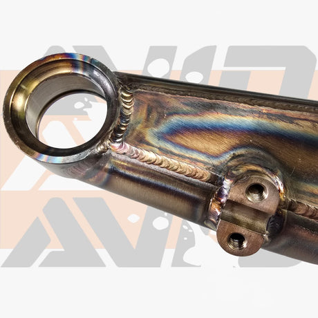 Close-up of AVID Racing TIG-welded chromoly suspension arm with precision-machined mounting tab