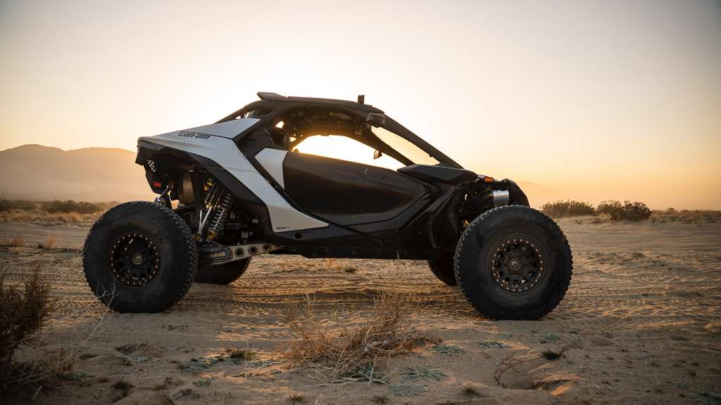 AVID Racing Can-Am Maverick R Baja Race front control arm and dual shock rear in the desert